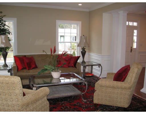 183 Middlesex Road Brookline, MA 02467 - Photo 5 of 16 a living room with furniture and a window