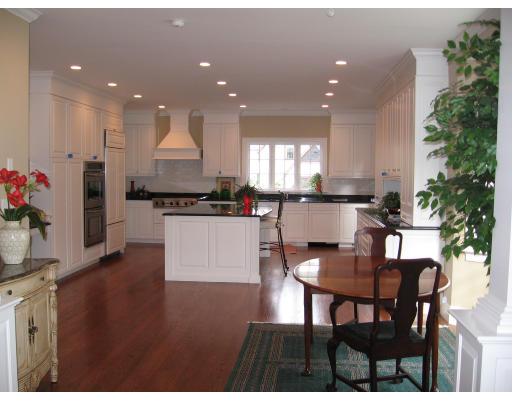 183 Middlesex Road Brookline, MA 02467 - Photo 7 of 16 a kitchen with a table and chairs in it