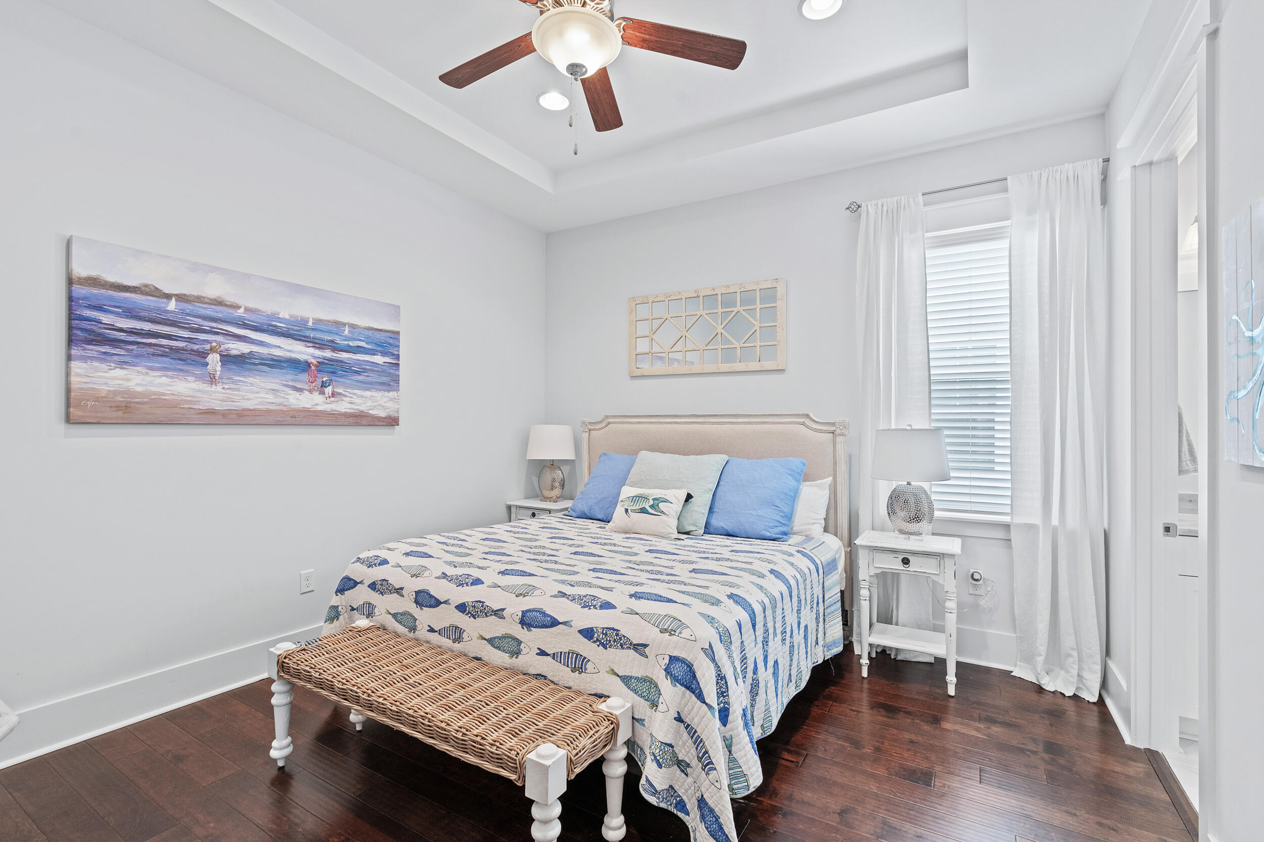 282 Flatwoods Forest Loop Santa Rosa Beach, FL 32459 - Photo 13 of 52 a bedroom with a bed and a chandelier