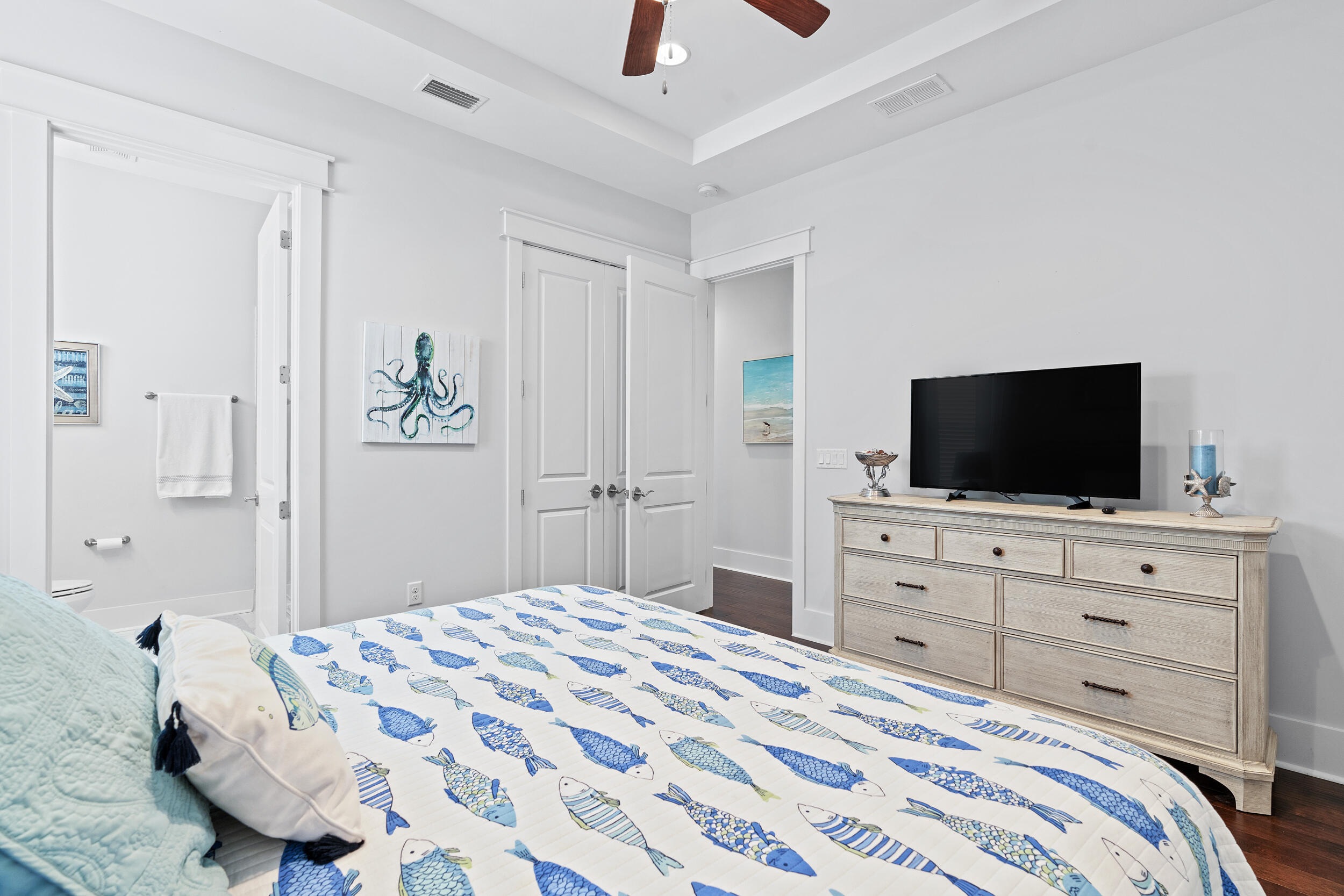 282 Flatwoods Forest Loop Santa Rosa Beach, FL 32459 - Photo 14 of 52 a bedroom with a bed and a flat screen tv in it