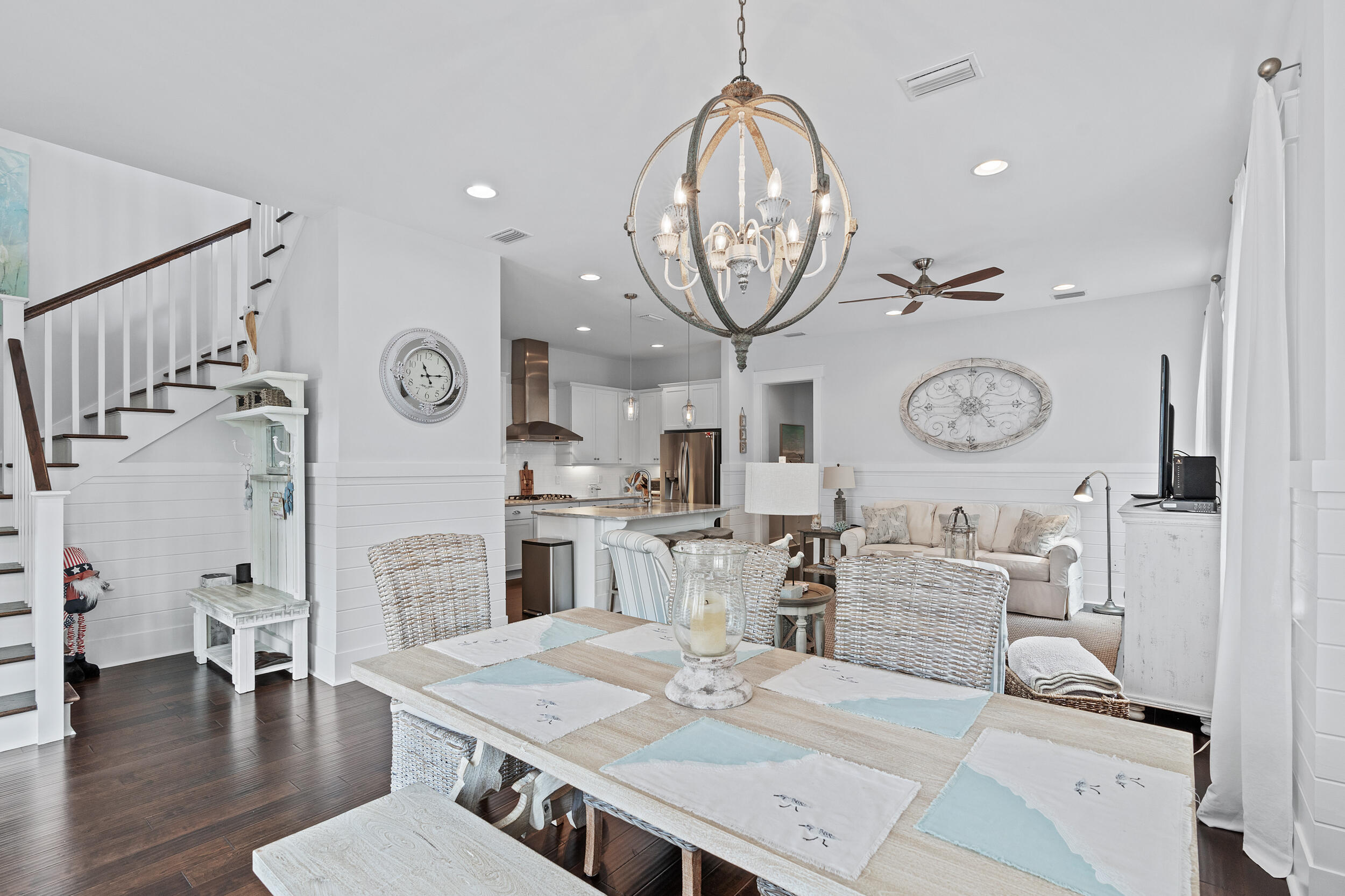 282 Flatwoods Forest Loop Santa Rosa Beach, FL 32459 - Photo 16 of 52 a living room with furniture and a clock