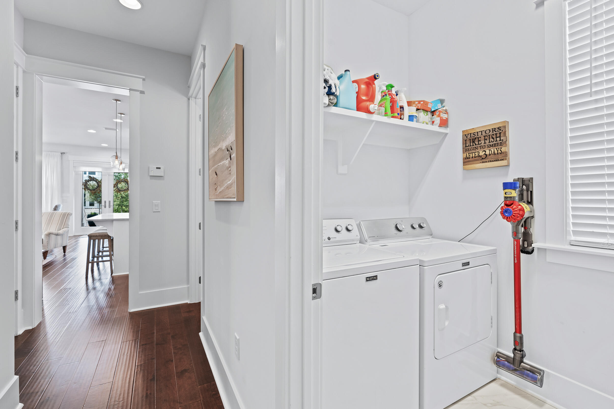 282 Flatwoods Forest Loop Santa Rosa Beach, FL 32459 - Photo 17 of 52 a storage room with wooden floor and cabinets