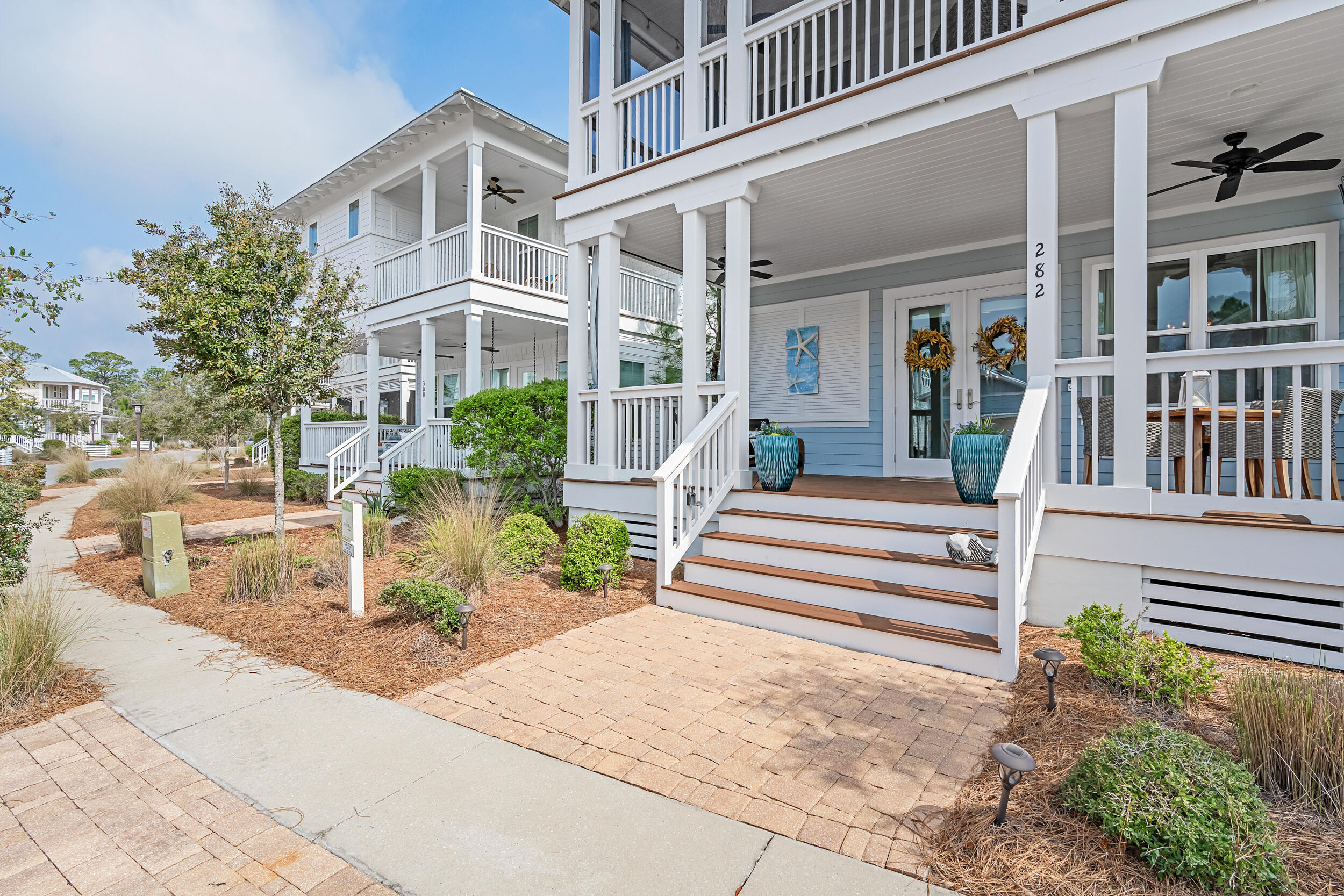 282 Flatwoods Forest Loop Santa Rosa Beach, FL 32459 - Photo 2 of 52 front view of a house with a yard