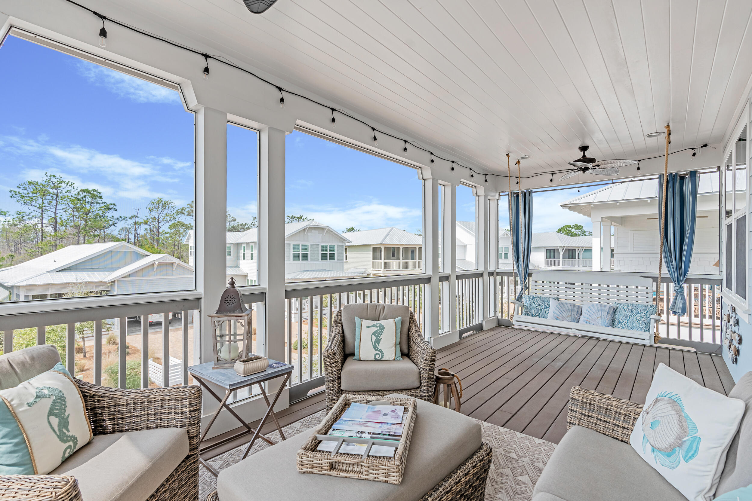 282 Flatwoods Forest Loop Santa Rosa Beach, FL 32459 - Photo 23 of 52 a living room with furniture and a large window