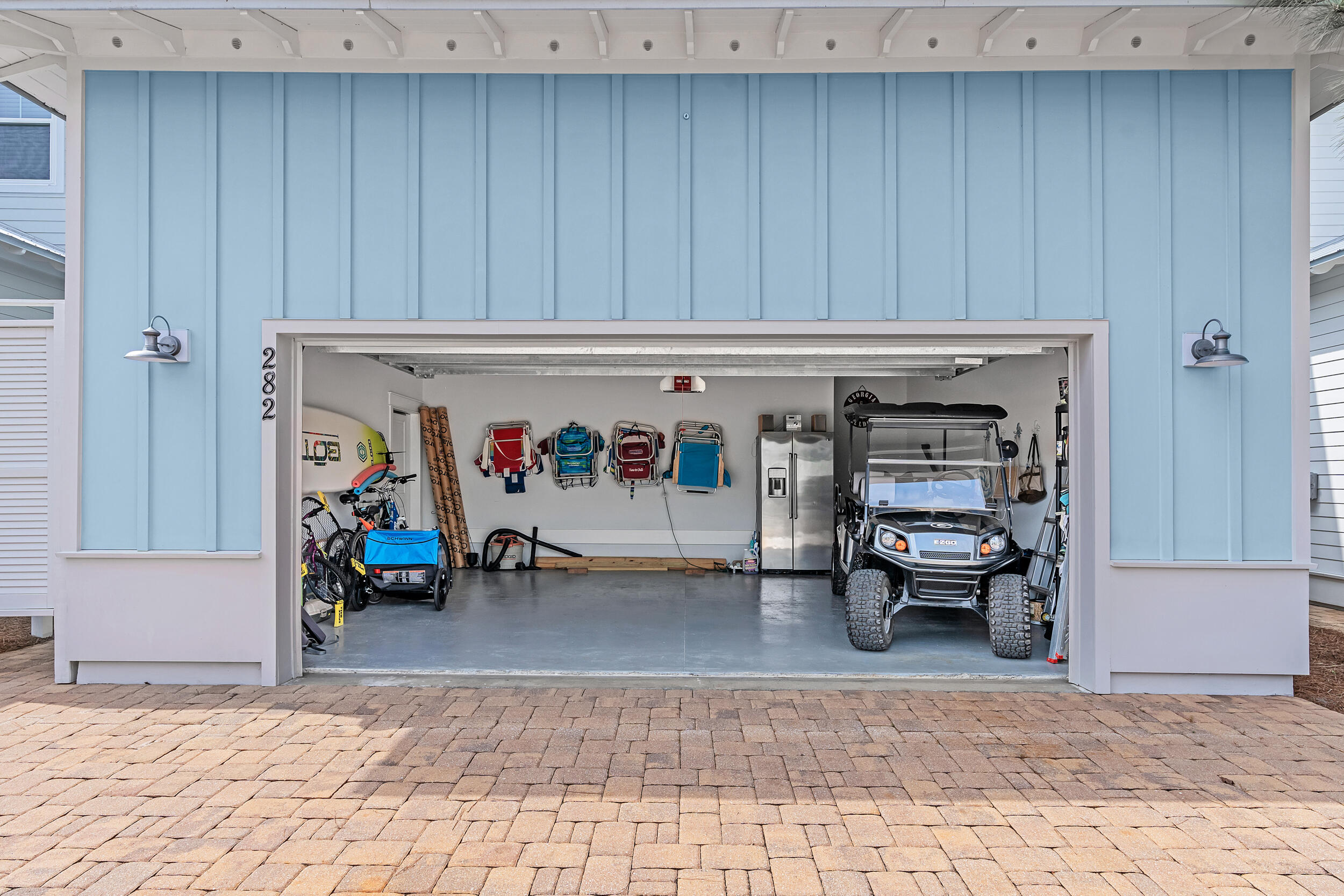 282 Flatwoods Forest Loop Santa Rosa Beach, FL 32459 - Photo 32 of 52 a living room with furniture and a table