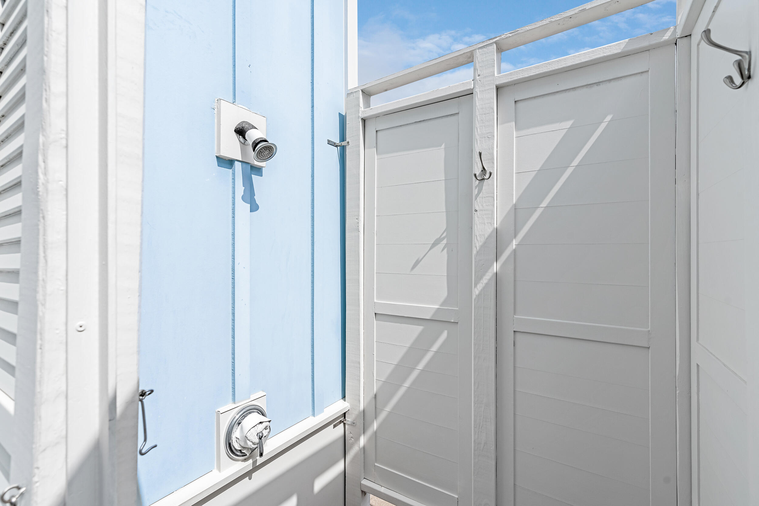 282 Flatwoods Forest Loop Santa Rosa Beach, FL 32459 - Photo 34 of 52 a view of a livingroom with a floor to ceiling window and stairs