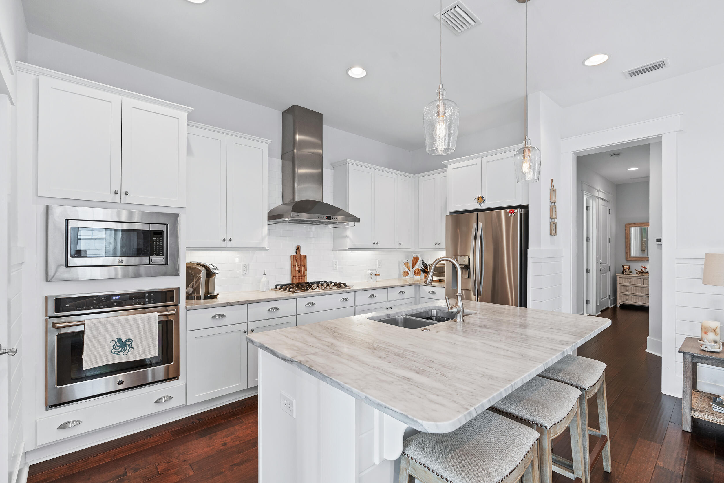 282 Flatwoods Forest Loop Santa Rosa Beach, FL 32459 - Photo 9 of 52 a kitchen with stainless steel appliances granite countertop a sink stove and refrigerator