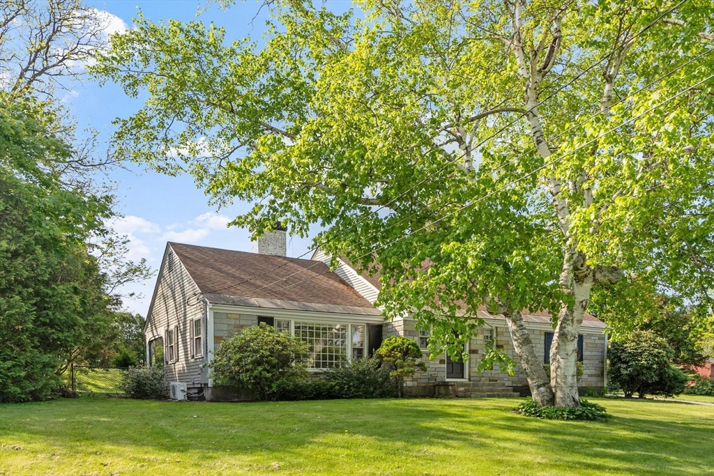 454 Wilson Street Clinton, MA 01510 - Photo 3 of 39 a view of a house with a yard