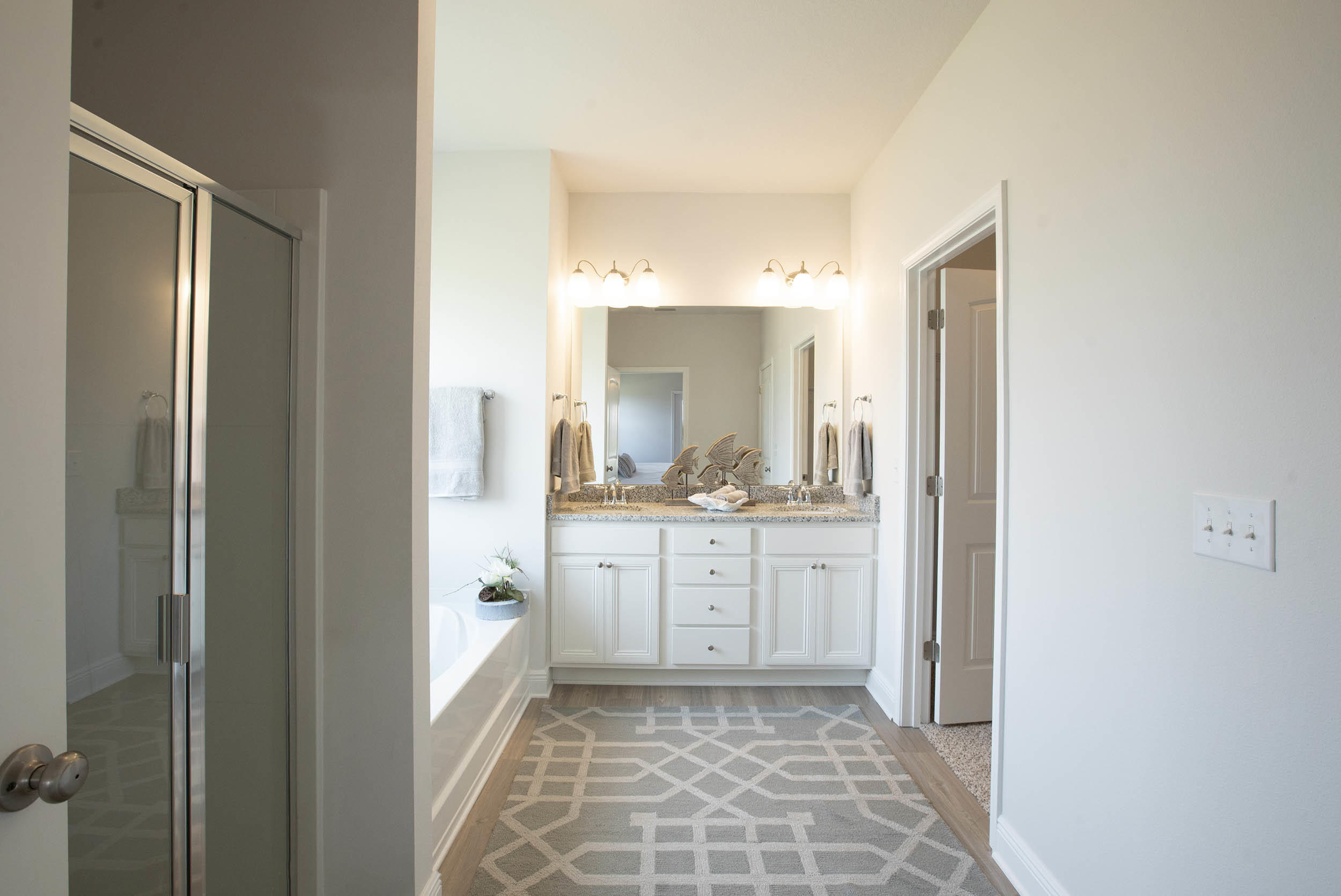 98 Beaver Trl Drive Freeport, FL 32439 - Photo 15 of 18 a bathroom with a granite countertop sink and a mirror