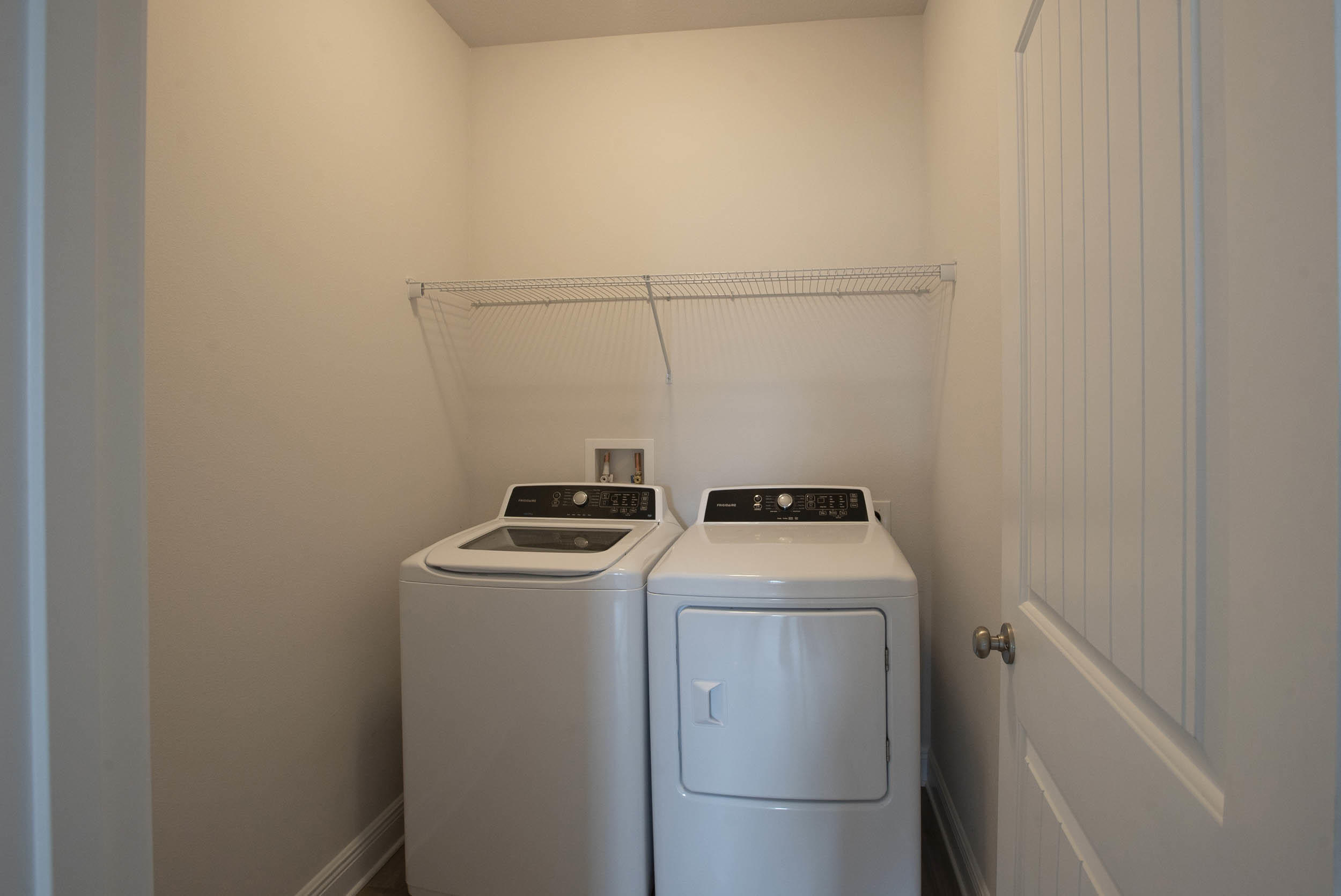 98 Beaver Trl Drive Freeport, FL 32439 - Photo 17 of 18 a utility room with dryer and washer