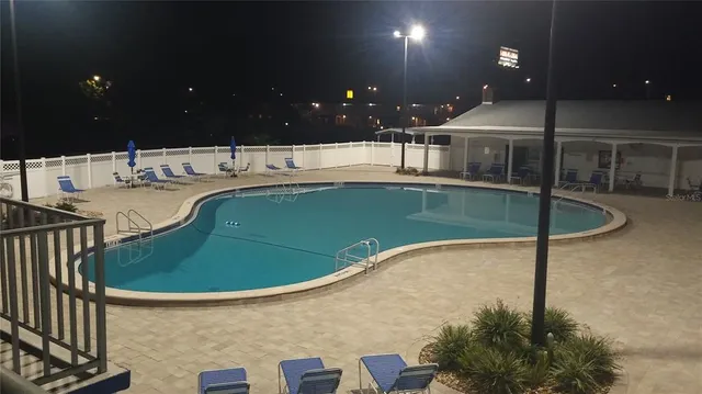 a view of a swimming pool and outdoor space