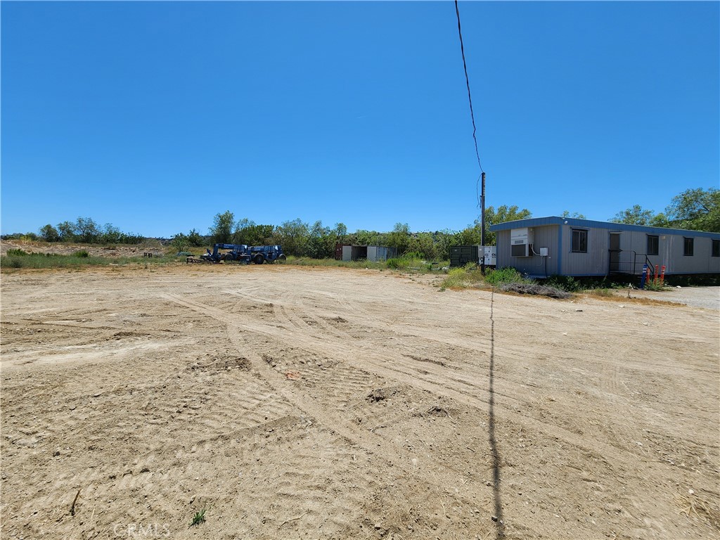 24000 Hidden Ridge Road Hidden Hills, CA 91302 - Photo 5 of 5 Building pad with office trailer located at the right side of the lot at the top of the driveway.