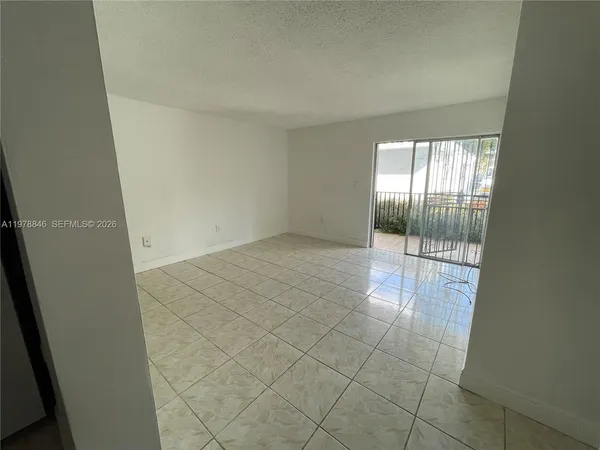 an empty room with sliding door