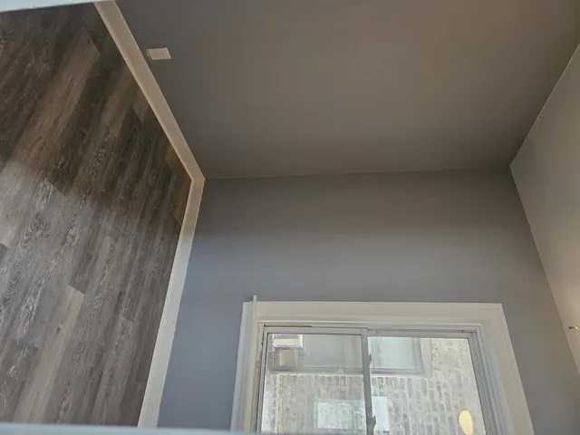 a bathroom with a toilet sink and shower