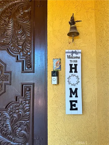 a view of a hallway with wooden shelves