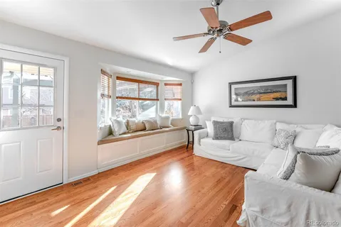 a bedroom with a bed and a table