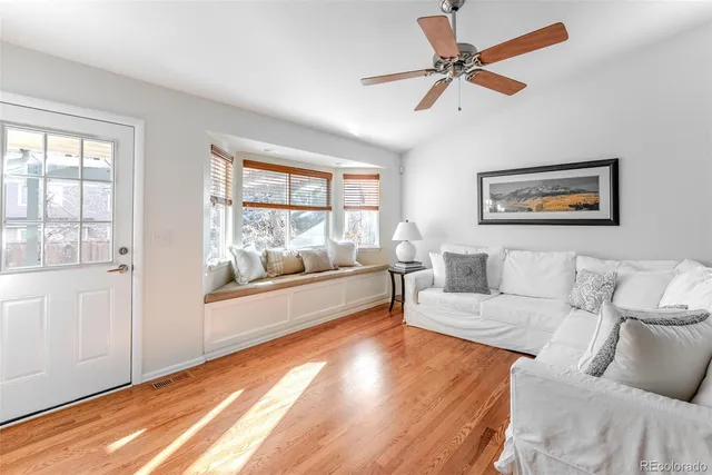 a bedroom with a bed and a table