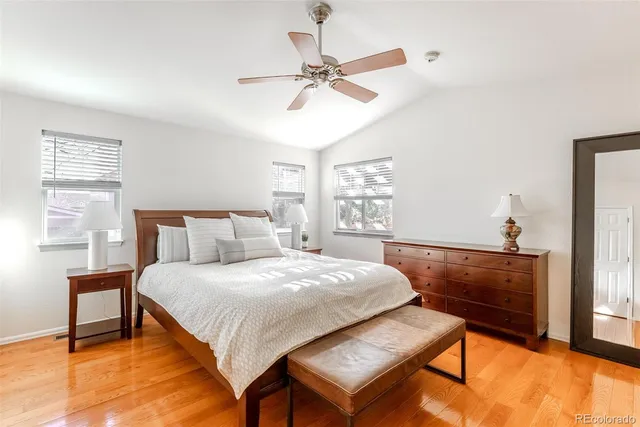 a bathroom with a double vanity sink mirror and toilet