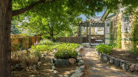 a backyard of a house with lots of green space