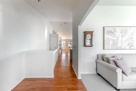 a kitchen with stainless steel appliances granite countertop a sink a stove and center island