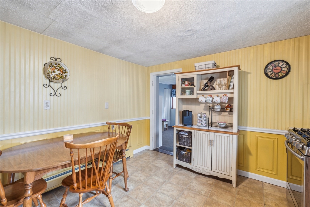 20 Hemlock Road Holbrook, MA 02343 - Photo 20 of 32 a view of a dining room with furniture and a table