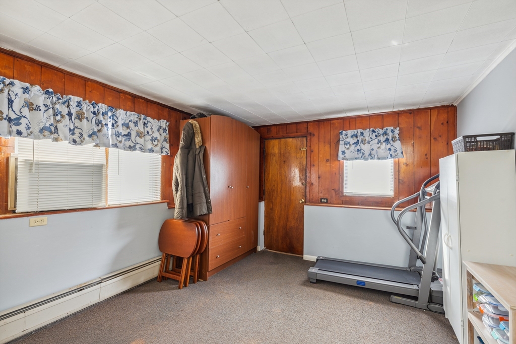 20 Hemlock Road Holbrook, MA 02343 - Photo 22 of 32 a room with gym equipment and a large window