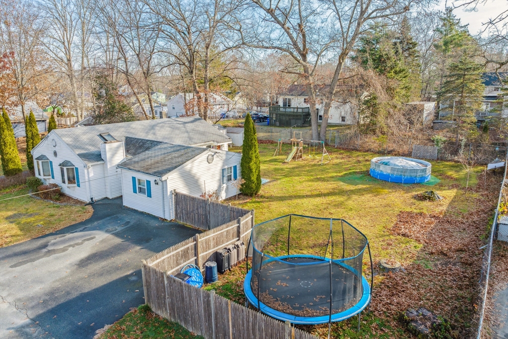 20 Hemlock Road Holbrook, MA 02343 - Photo 29 of 32 a view of a swimming pool with an outdoor seating