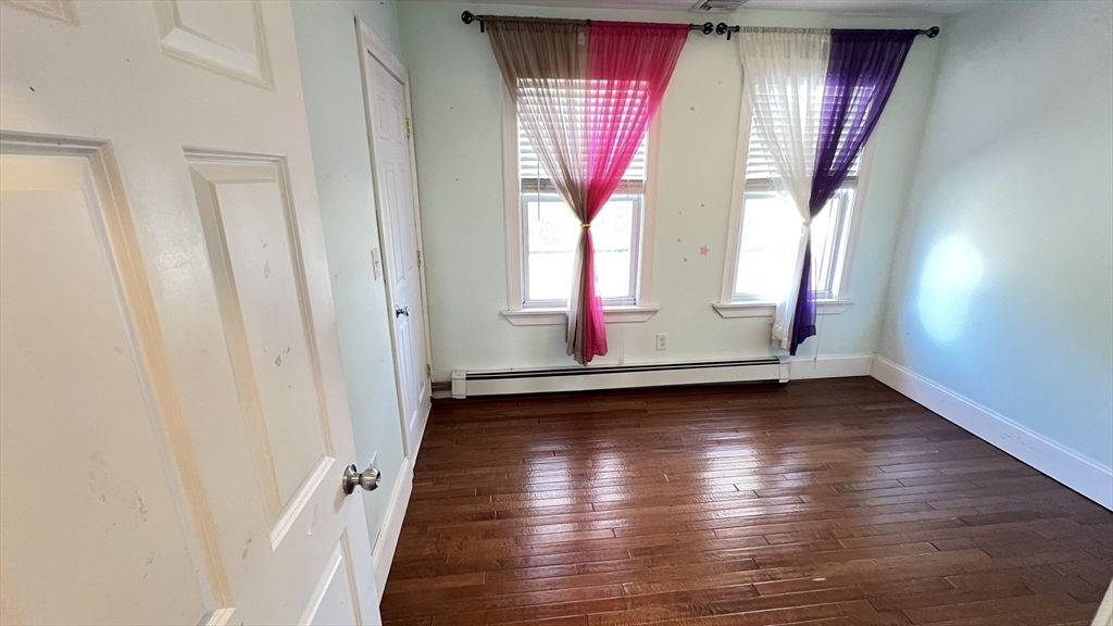 3 Mill St Court, Unit 2 Danvers, MA 01923 - Photo 11 of 23 a view of an entryway with wooden floor