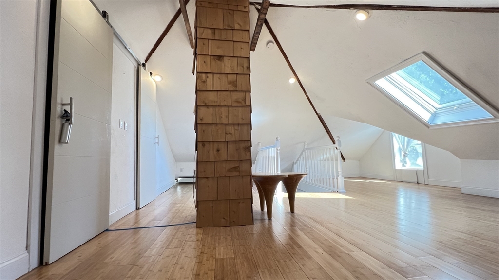 3 Mill St Court, Unit 2 Danvers, MA 01923 - Photo 21 of 23 a view of entryway and hall with wooden floor