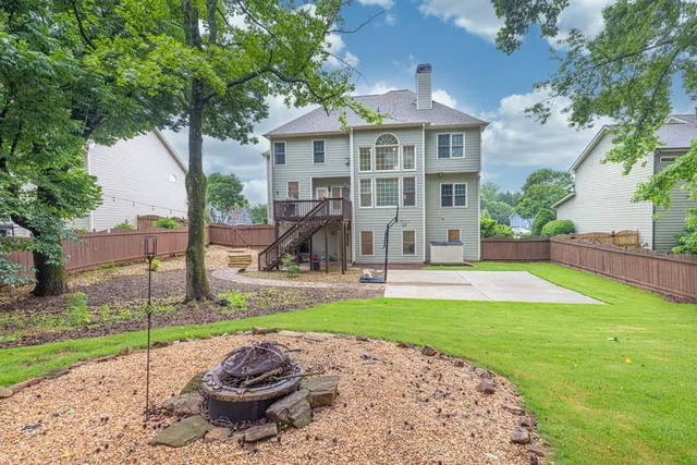 a view of a house with a swimming pool