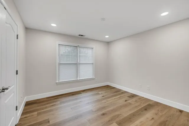 a living room with furniture and window
