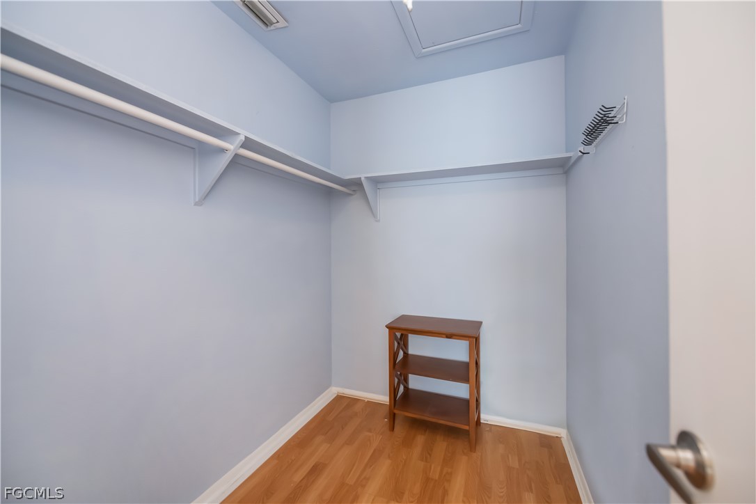 1100 Pondella Road, Unit 514 Cape Coral, FL 33909 - Photo 15 of 34 a view of a room with wooden floor