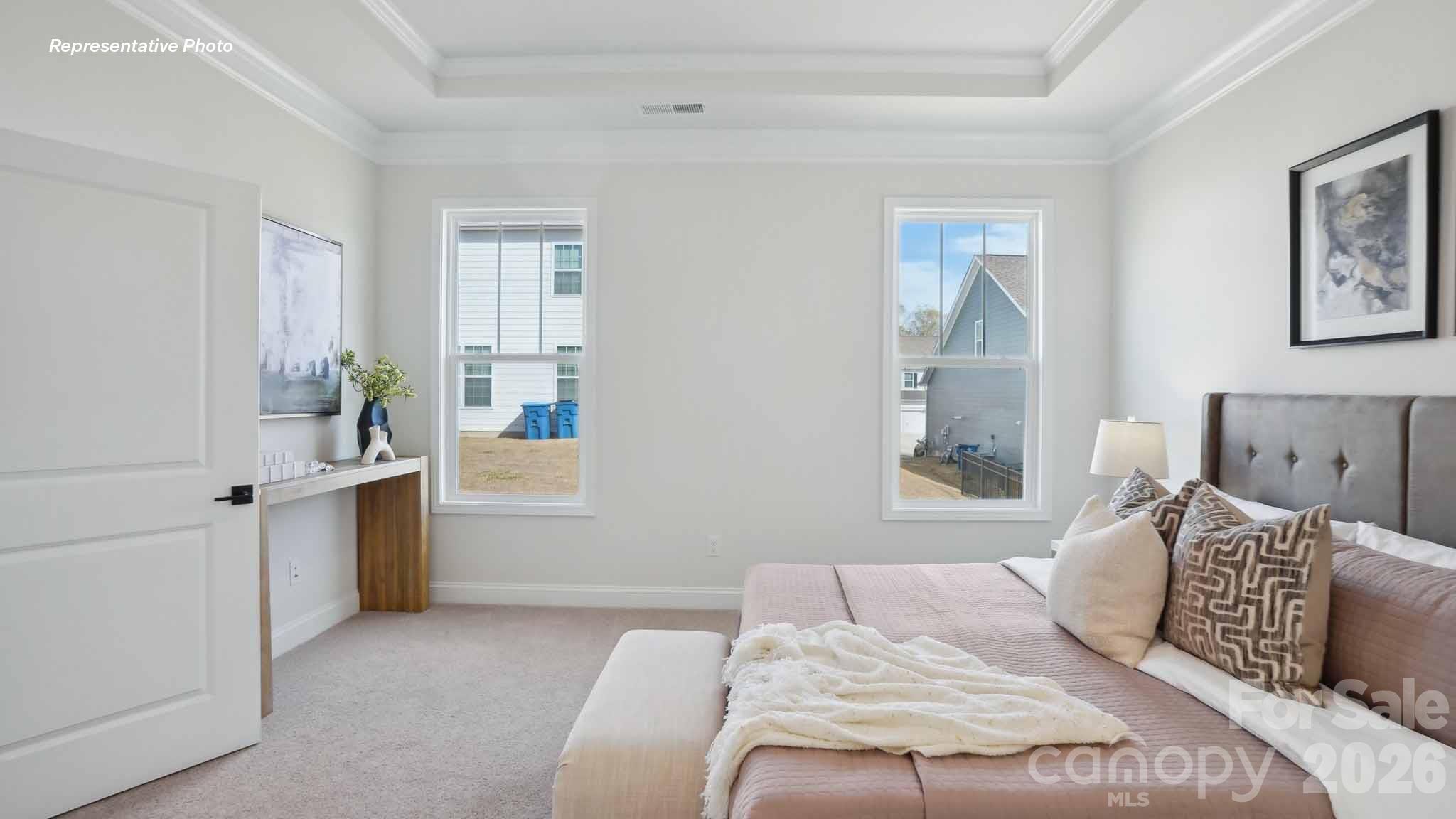 7625 Bainbridge Road Sherrills Ford, NC 28673 - Photo 14 of 24 a bedroom with a large bed and a window