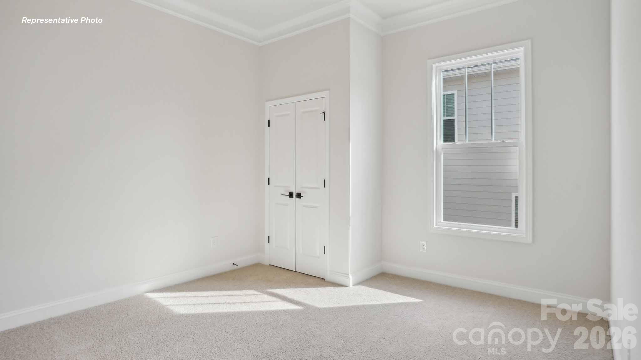 7625 Bainbridge Road Sherrills Ford, NC 28673 - Photo 18 of 24 an empty room with windows