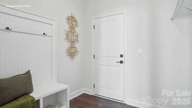 a room that has a window and a wooden floor