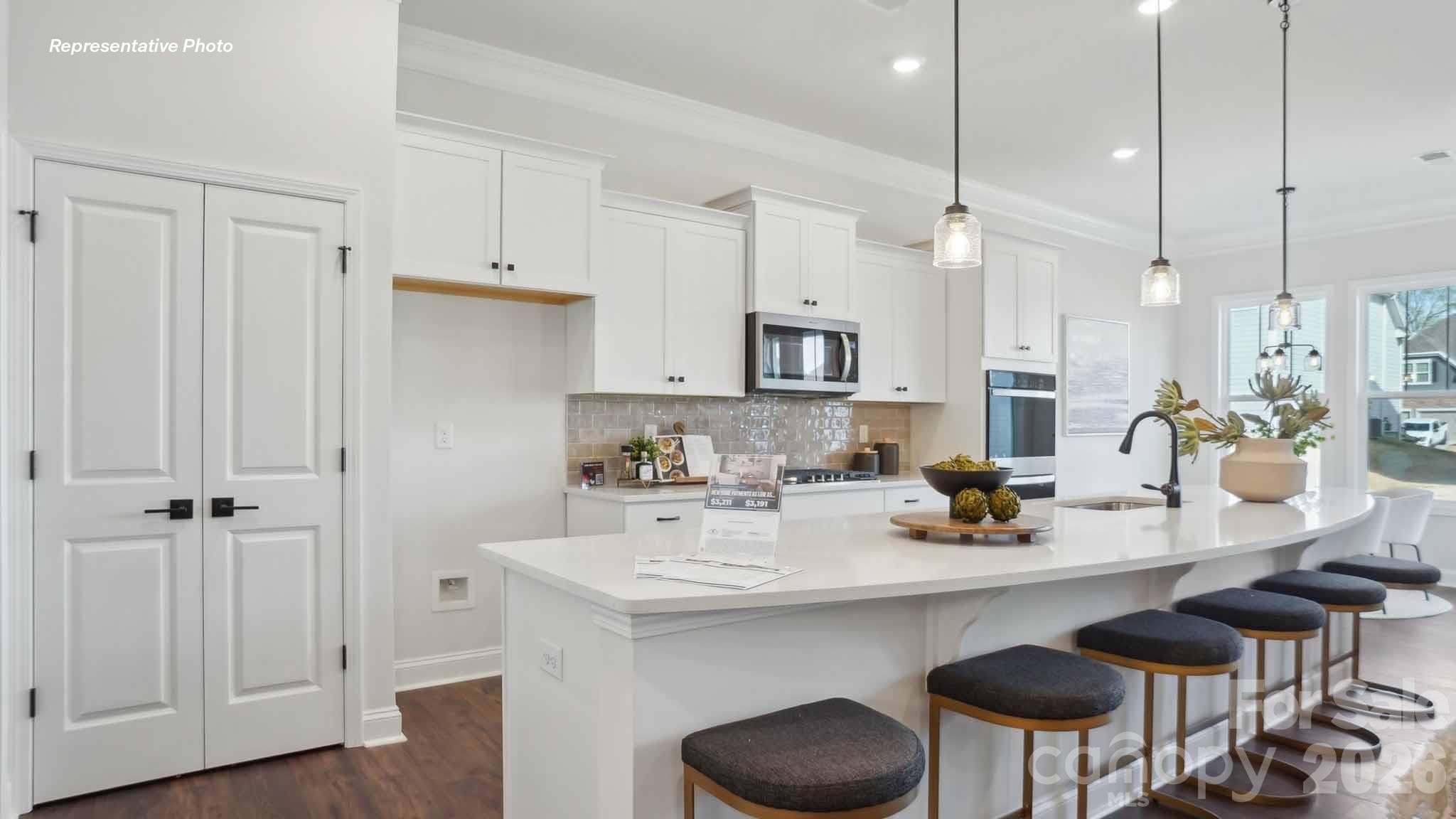 7625 Bainbridge Road Sherrills Ford, NC 28673 - Photo 4 of 24 a kitchen with a sink cabinets and wooden floor