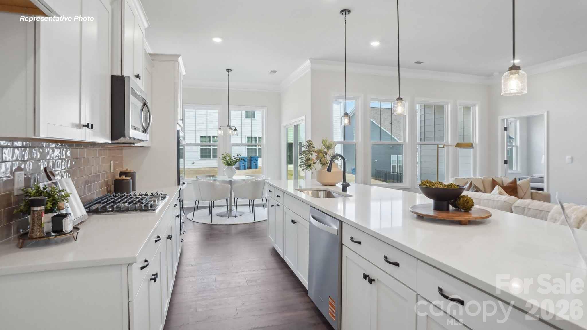 7625 Bainbridge Road Sherrills Ford, NC 28673 - Photo 5 of 24 a kitchen with counter top space a sink stainless steel appliances and cabinets