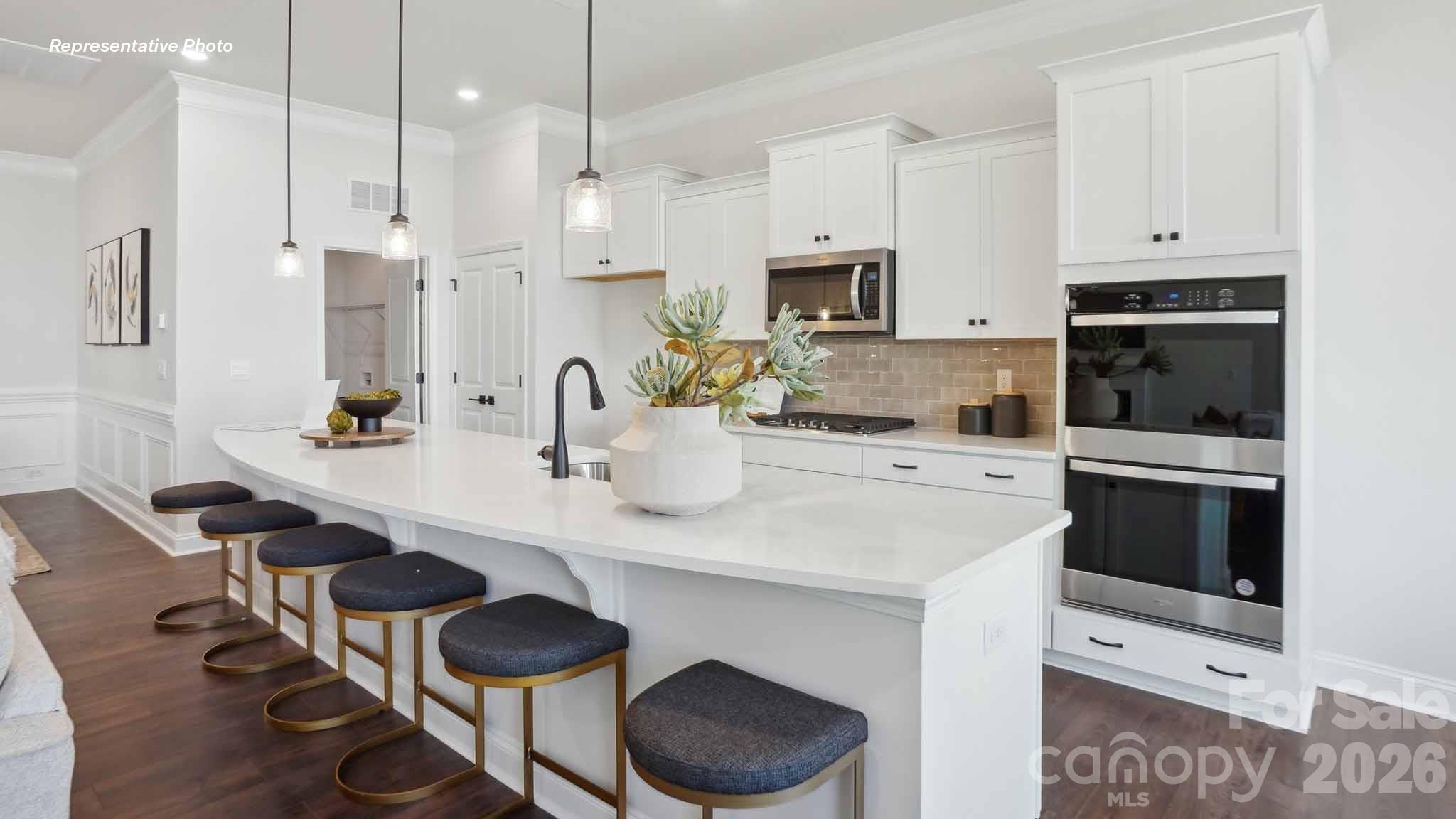 7625 Bainbridge Road Sherrills Ford, NC 28673 - Photo 6 of 24 a kitchen with stainless steel appliances a sink a stove a refrigerator and cabinets