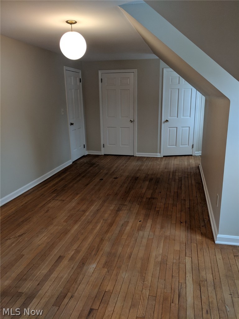 1305 Bell Road Chagrin Falls, OH 44022 - Photo 17 of 19 Upstairs front 2nd bedroom has fresh paint, hardwood floors and two closets.