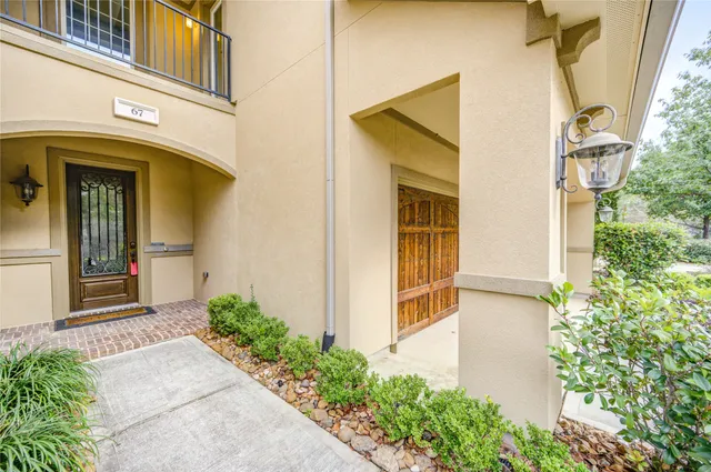 front view of a house with a small yard
