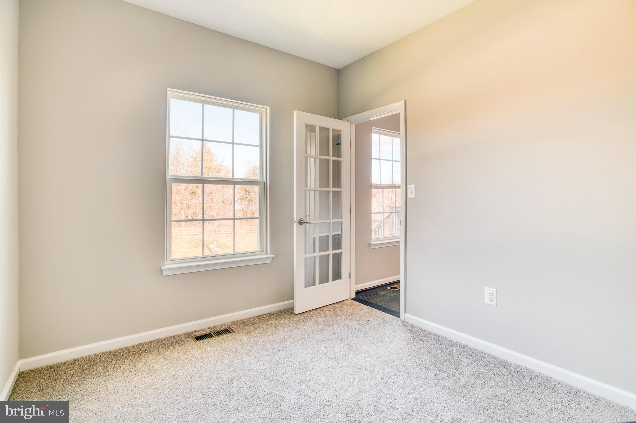 14510 Kingsmill Way Culpeper, VA 22701 - Photo 20 of 64 an empty room with windows