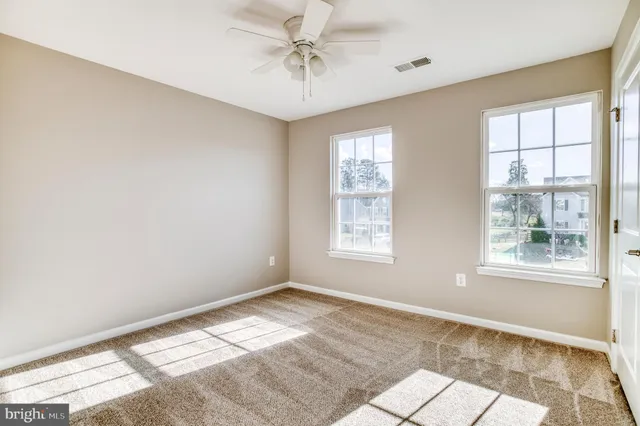a bathroom with a sink double vanity and a mirror