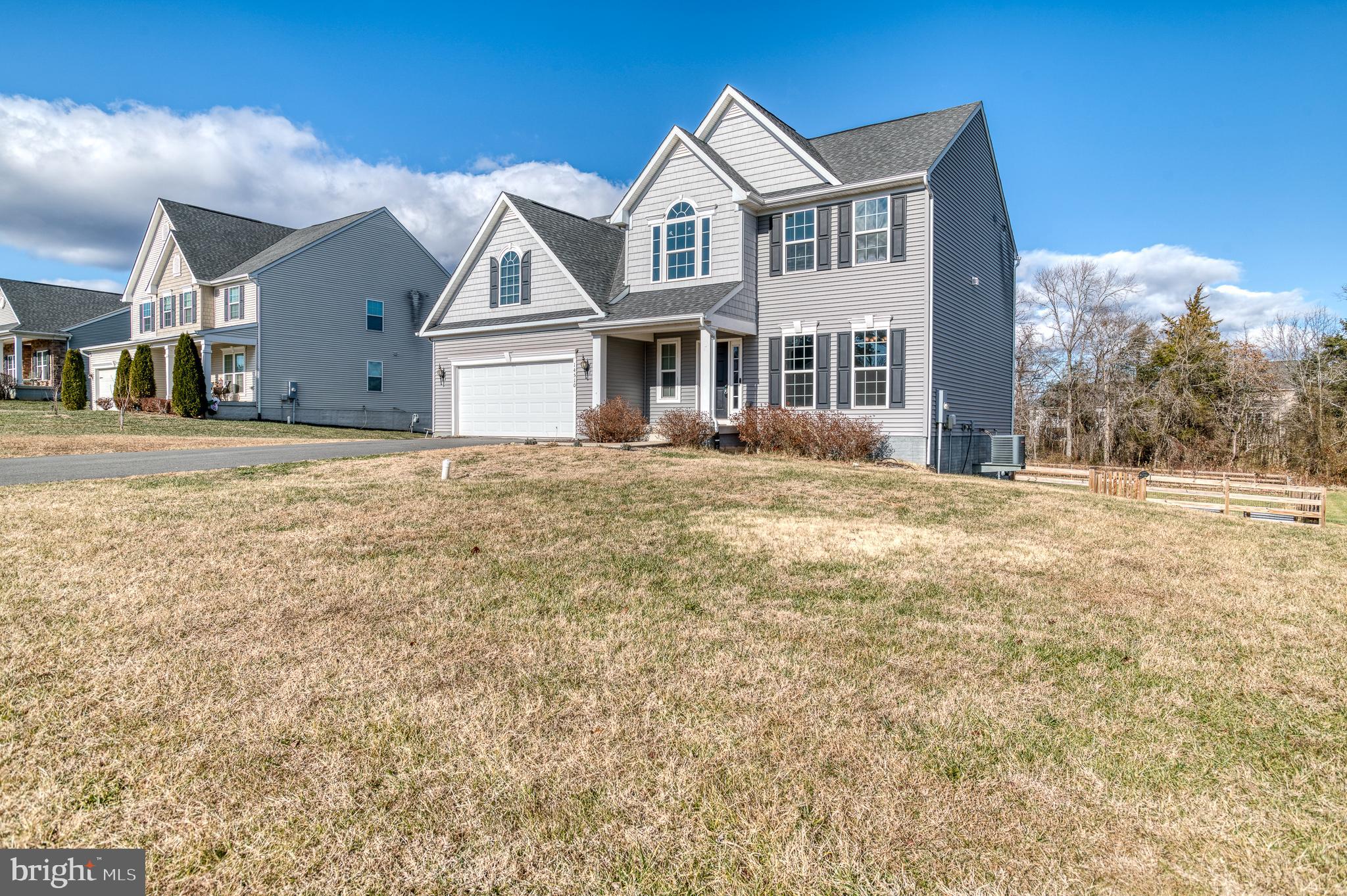 14510 Kingsmill Way Culpeper, VA 22701 - Photo 41 of 64 a front view of a house with a garden