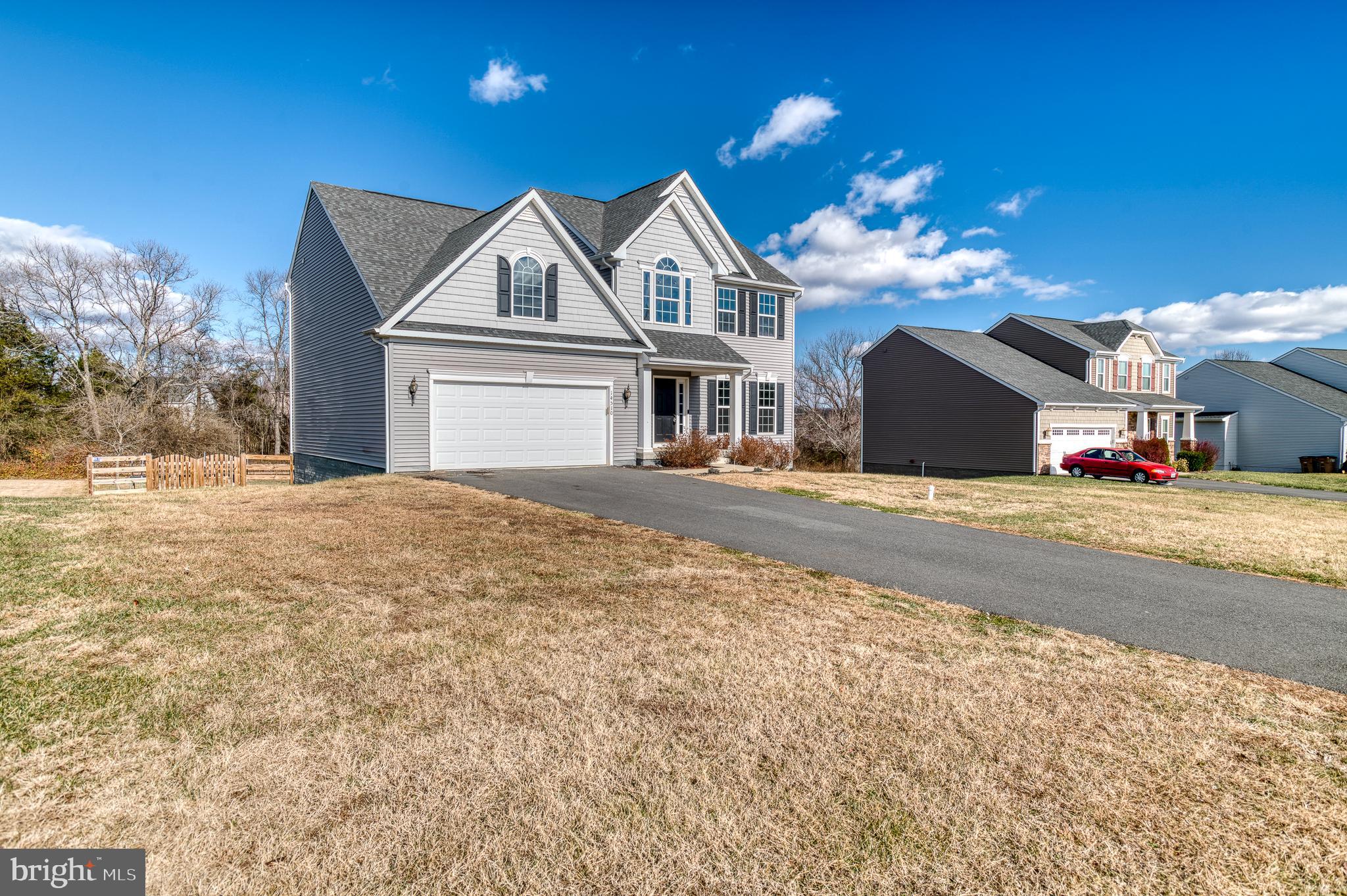 14510 Kingsmill Way Culpeper, VA 22701 - Photo 42 of 64 a front view of a house with a yard