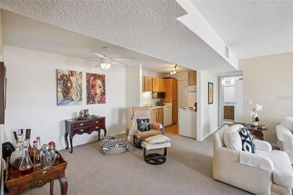 a spacious bedroom with a bed and furniture