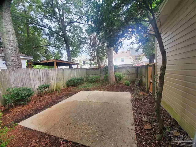 a view of backyard with green space