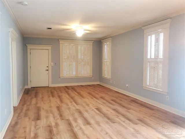 a view of an empty room and window