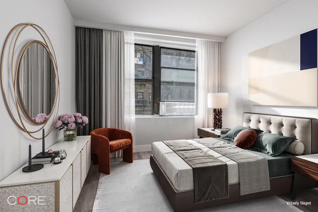 a kitchen that has a sink and a stove in it