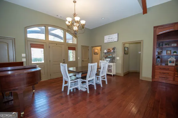 a living room with furniture or couch and a large window