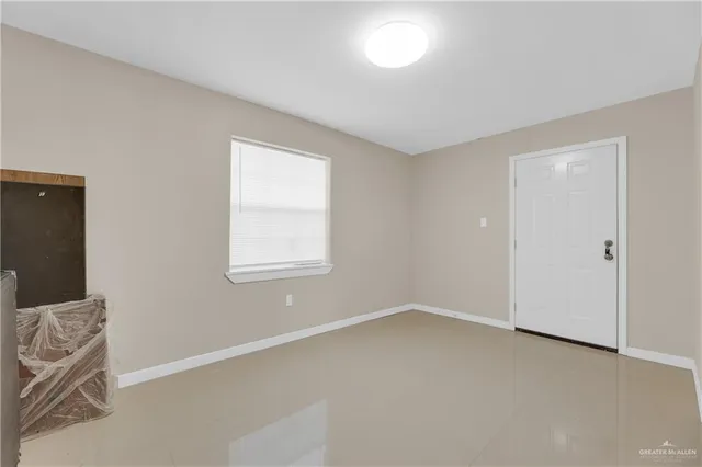 an empty room with windows